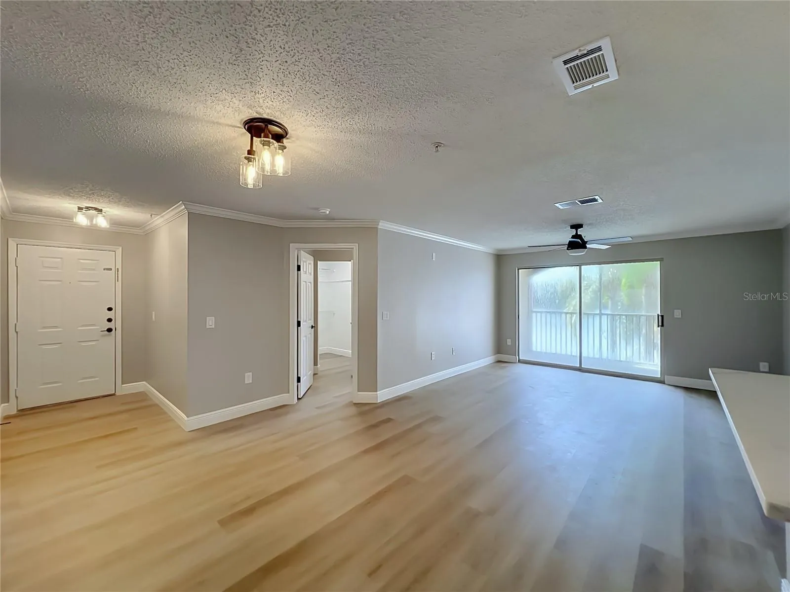Living Room facing Lake from breakfast bar