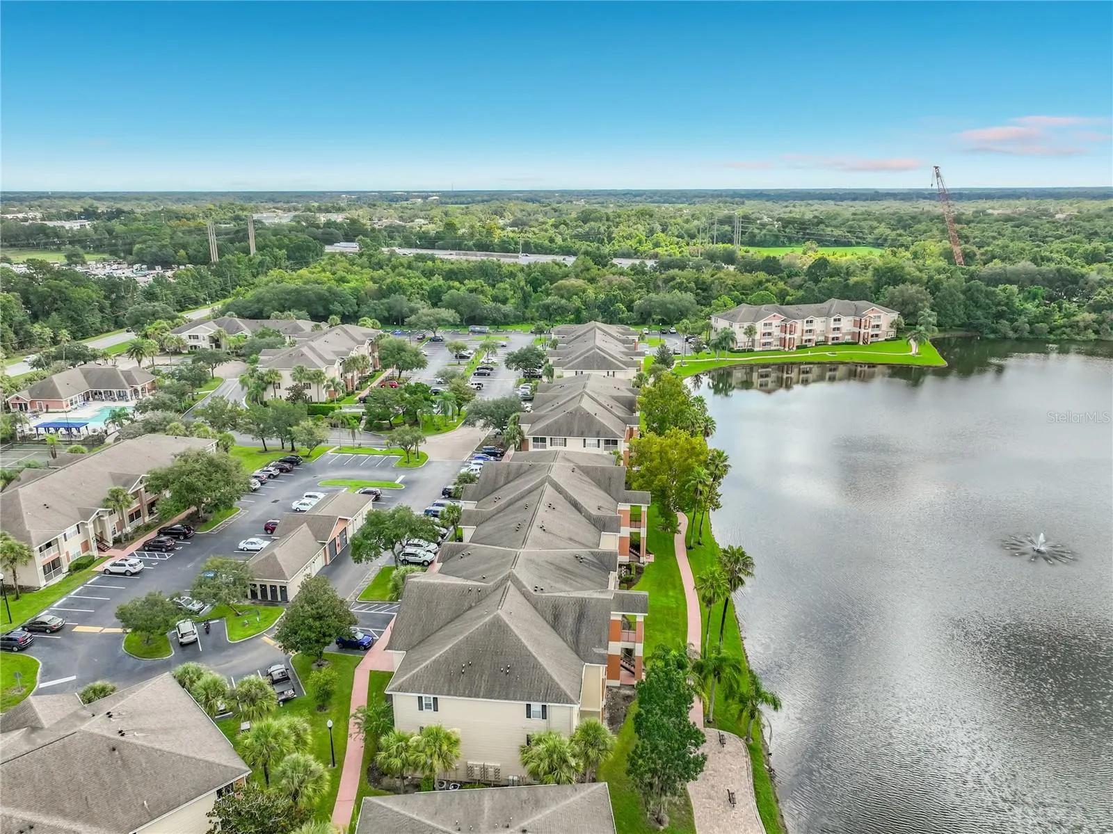 Beautiful walking path and lakefront directly behind your corner unit
