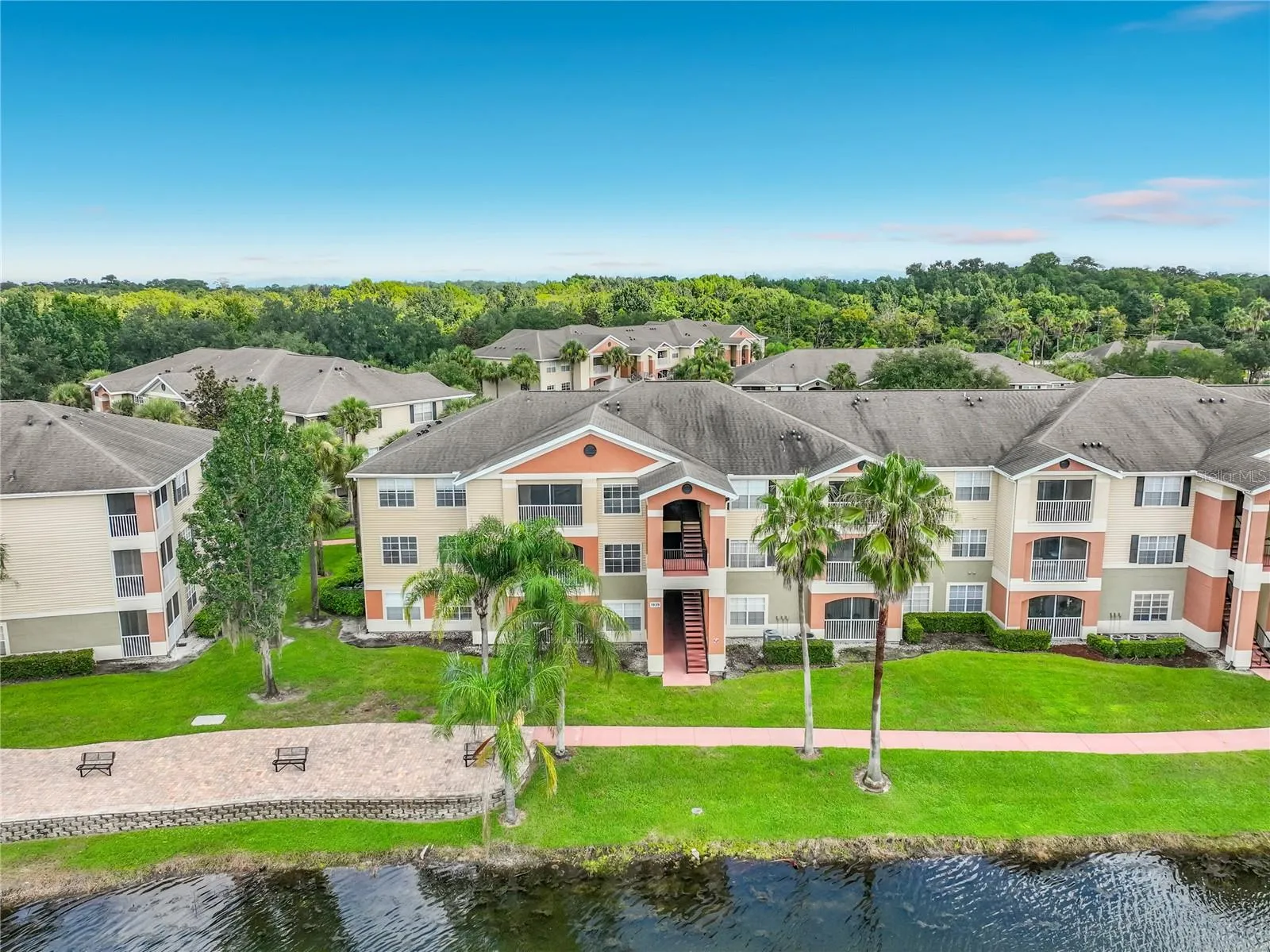 Beautiful walking path and lakefront directly behind your corner unit