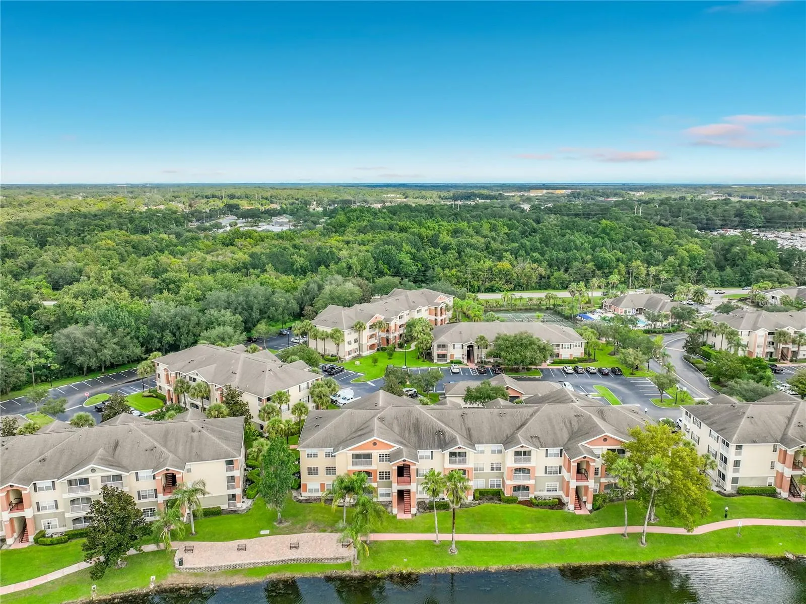 Beautiful walking path and lakefront directly behind your corner unit