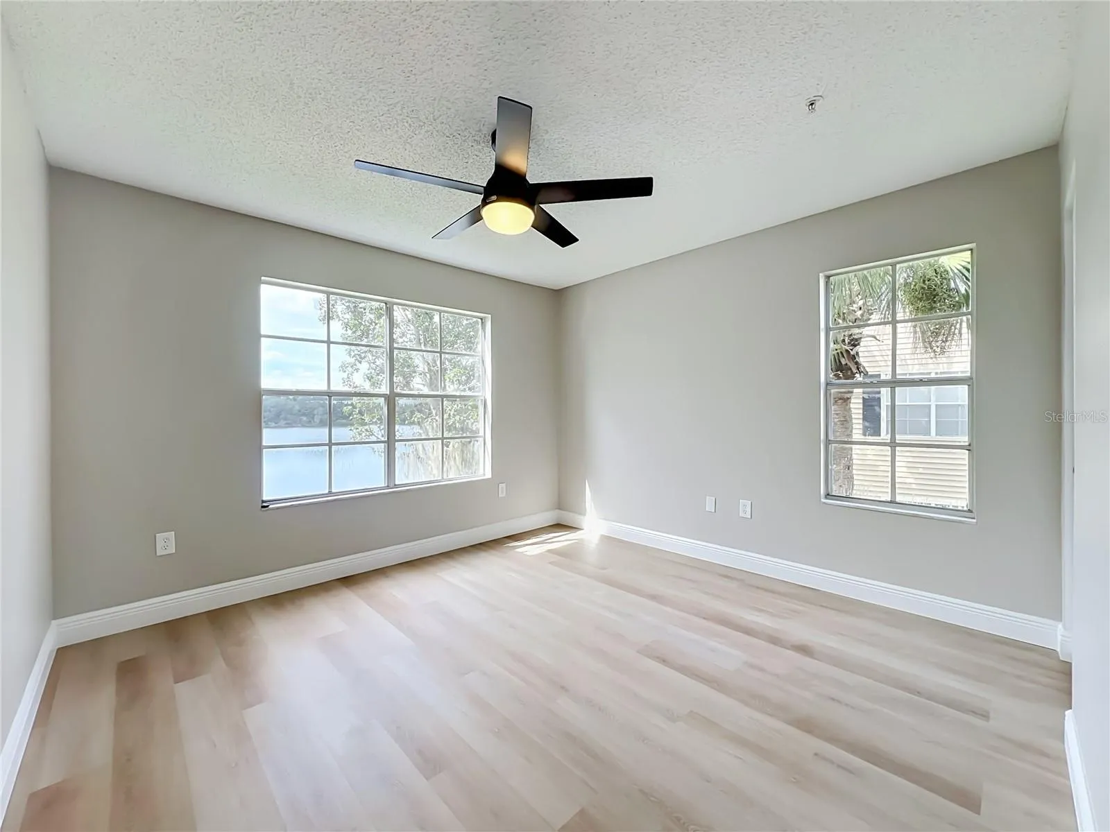 Bedroom 3 with incredible corner view facing the lake