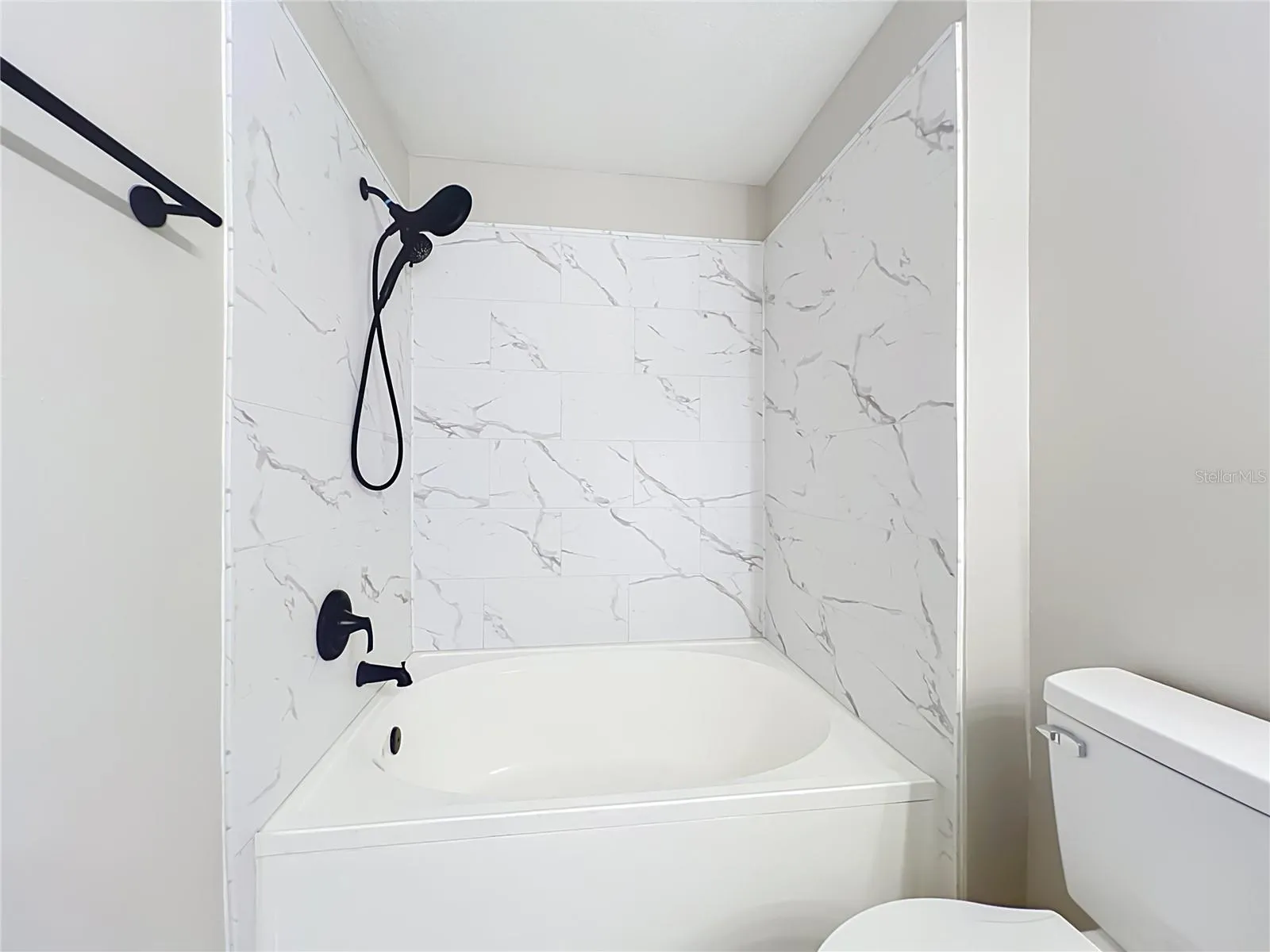 Bathroom 2 with beautifully done new tile.
