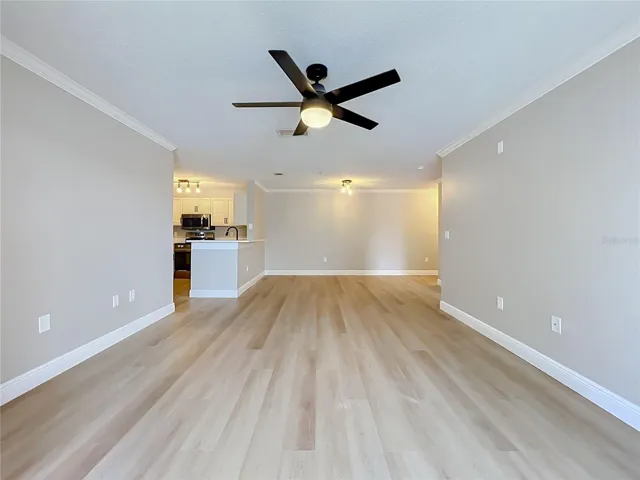 Living Room facing breakfast bar with lake at your back.  Open and Bright.