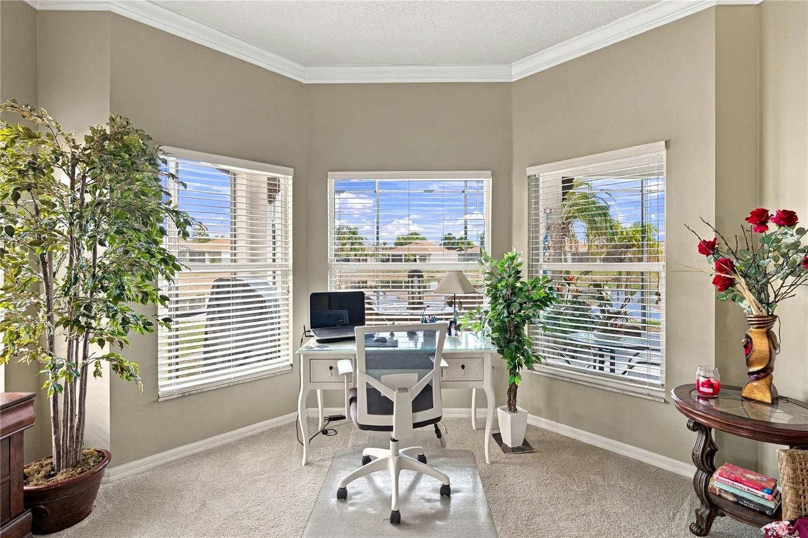 The bay window area in the primary bedroom offers a great view of the pond behind.