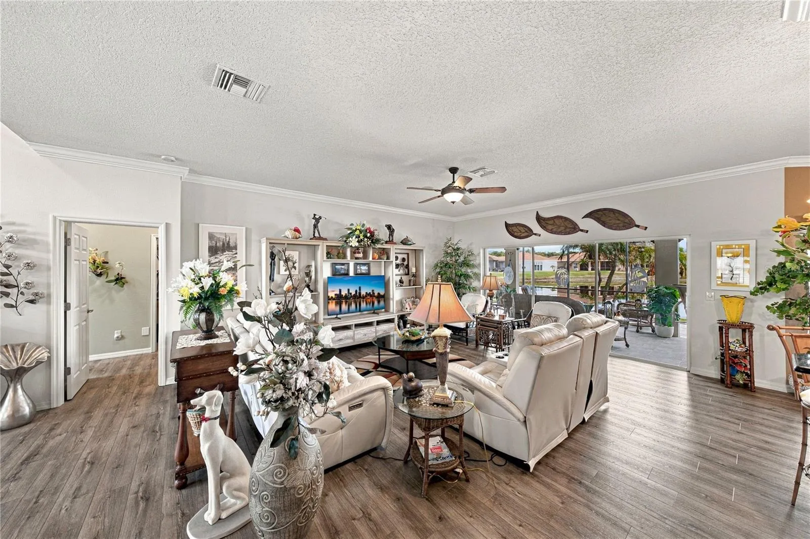 The large living room can easily accommodate your furniture.