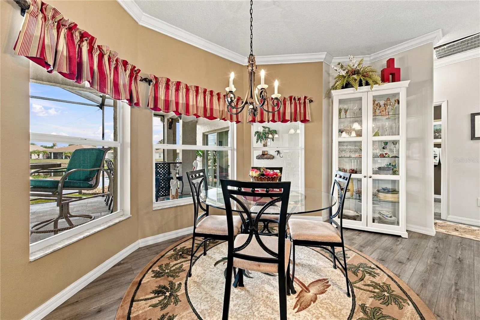 The dinette is in a bay window area with a great view of the pond behind.