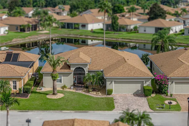 This home is located on a quiet street and backs up to a large pond.