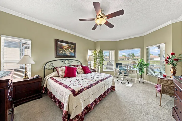 The primary suite fills the entire west wing. The primary bedroom has a bay window area.