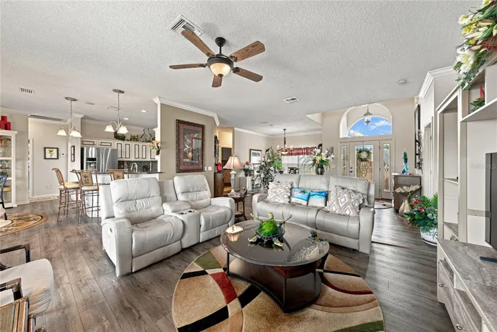 This view shows the relationship between the living room and the adjacent kitchen.