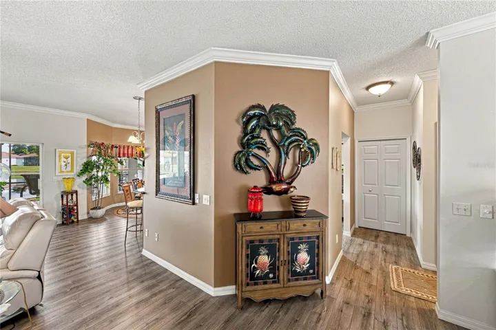 The presence of crown molding throughout the home adds class! The closet pantry is on the right.