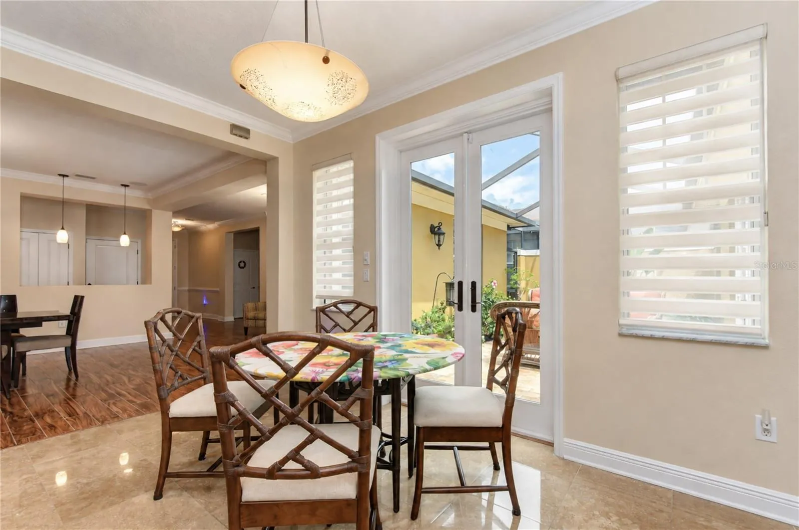 Eat-in breakfast nook with French doors leading to lanai