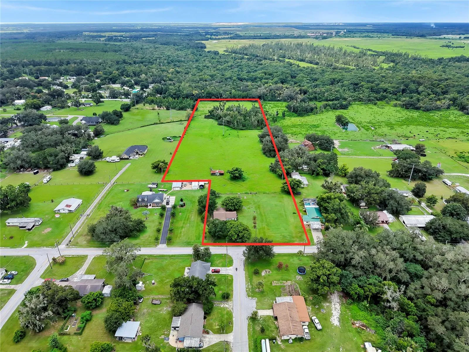 Plenty of space to build a dream home or divide the lot and resell 2-3 lots.