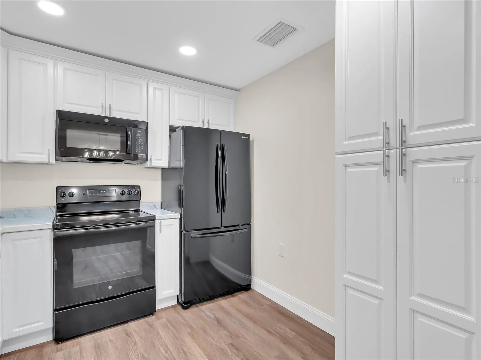 Kitchen with view of the Tall, Built in Cabinet Pantry storage