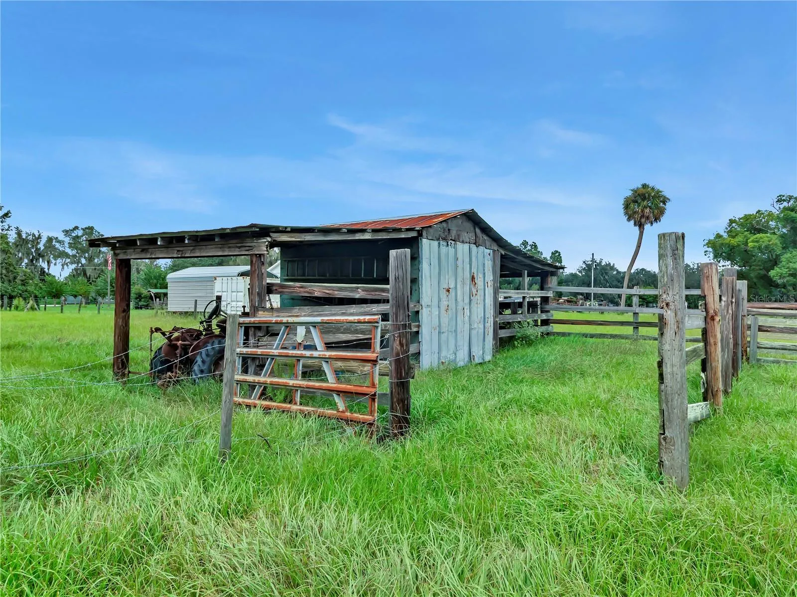 Tack shed with  pole barn covered areas, All personal property does not convey .