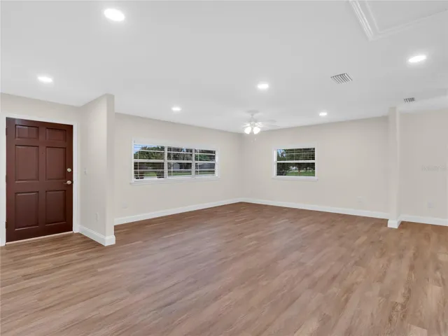 Show stopper!! Luxury Vinyl flooring , UPDATED LIGHTING,  ALL NEW walls and ceilings replaced with Insulation in this Gorgeous Renovated -MOVE IN READY HOME!!