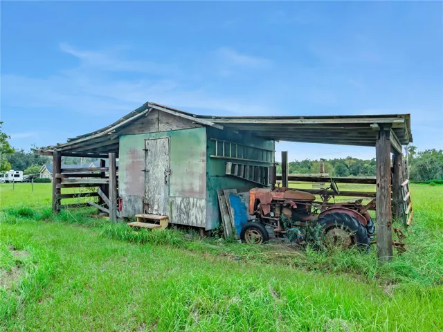 Shed storage pole barn covered areas. All Personal items- including Tractor do NOT convey with the sale.