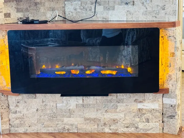 Built in electric fireplace located in the livingroom.
