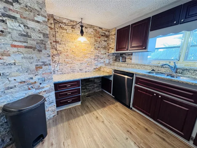 Stone wall accents throughout the living areas.