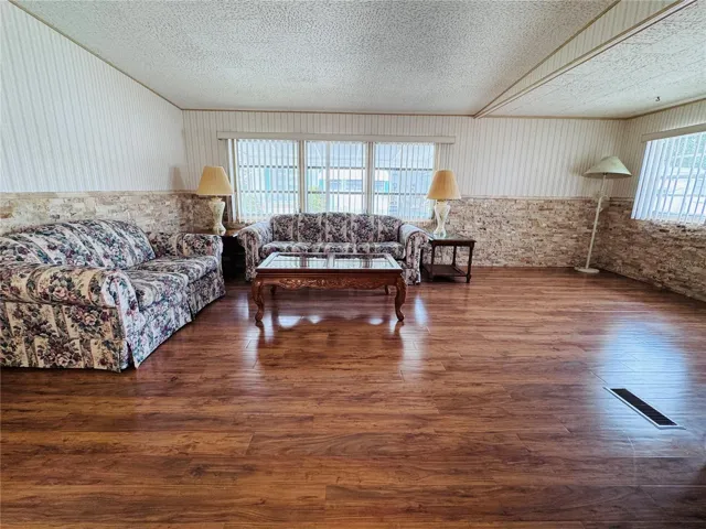 Beautiful Applewood Laminate Flooring throughout the home.