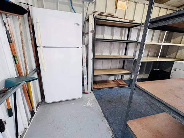 2nd refrigerator located in the shed.