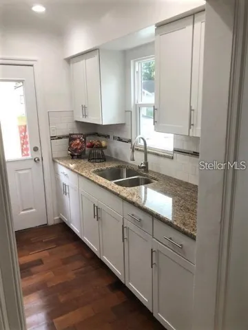 Kitchen with Granite Counter Tops and new cabinets.