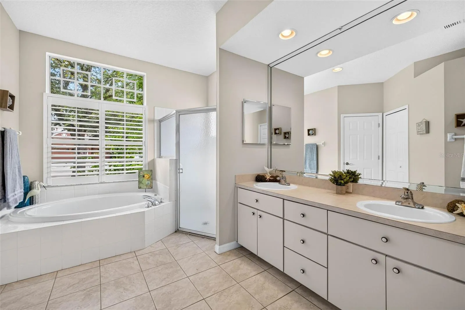 PRIMARY BATHROOM WITH GARDEN TUB AND SEPERATE SHOWER &amp; WATER CLOSET