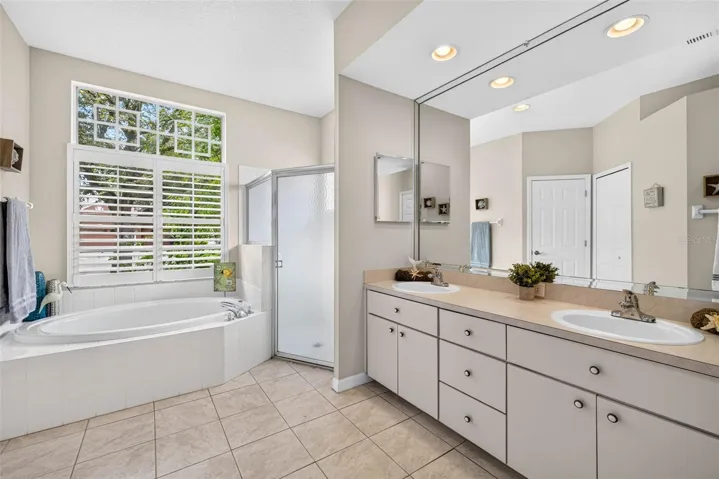 PRIMARY BATHROOM WITH GARDEN TUB AND SEPERATE SHOWER &amp; WATER CLOSET