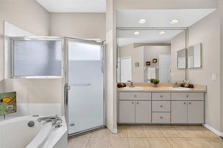 PRIMARY BATHROOM WITH GARDEN TUB AND DOUBLE SINKS, SEPERATE SHOWER