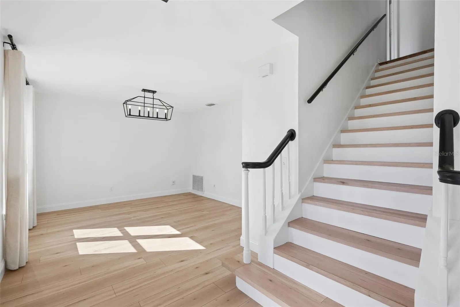Updated Laminate Flooring &amp; Custom Stairs