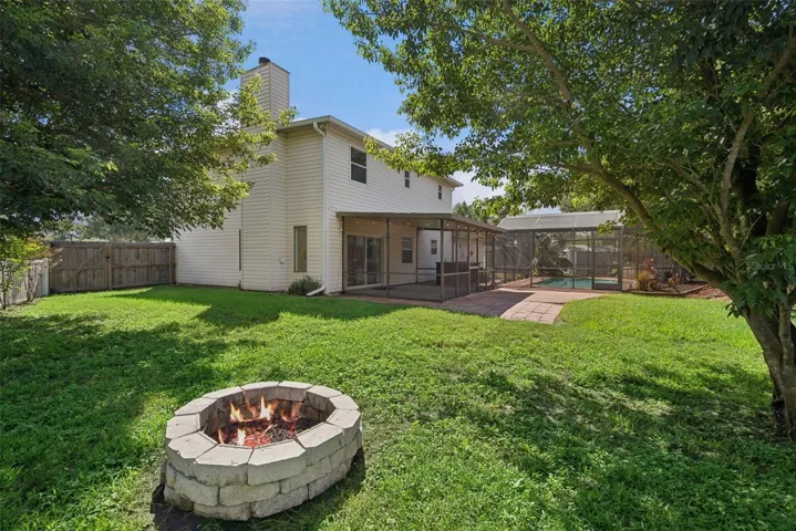 Side Yard With Stone Fire Pit