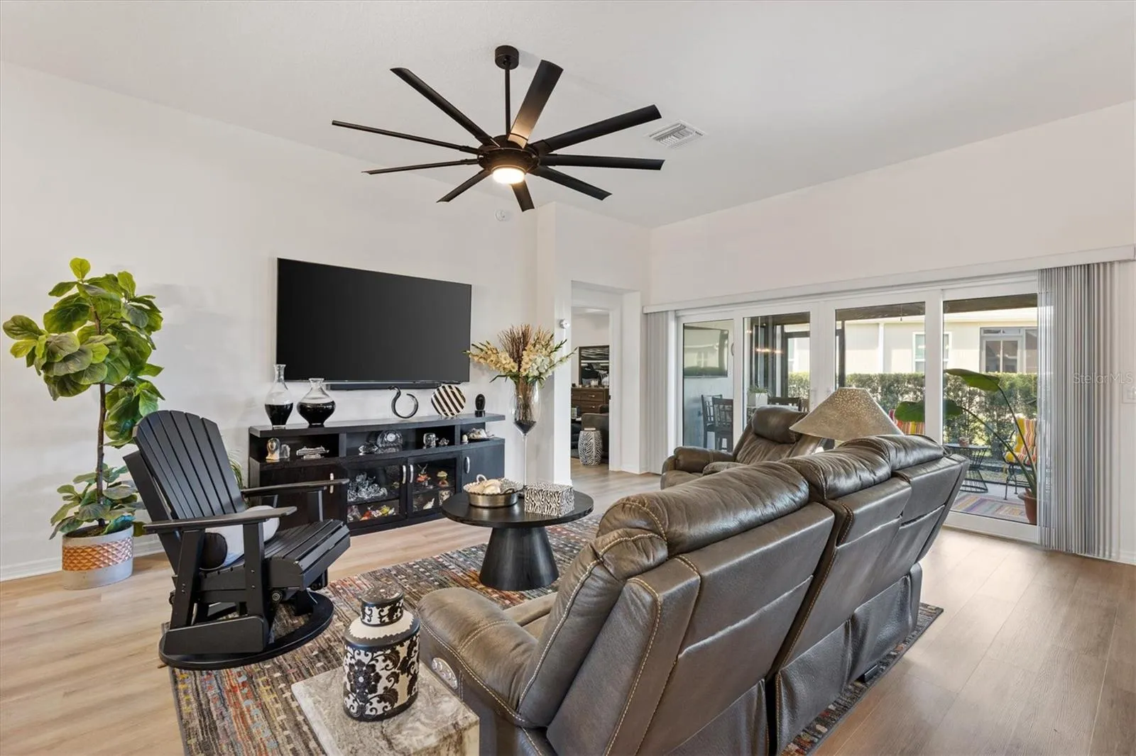 Lots of natural light from the glass silders across the back of the home