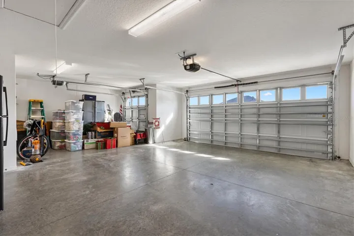 Spacious 2 car garage with Golf Car Garage