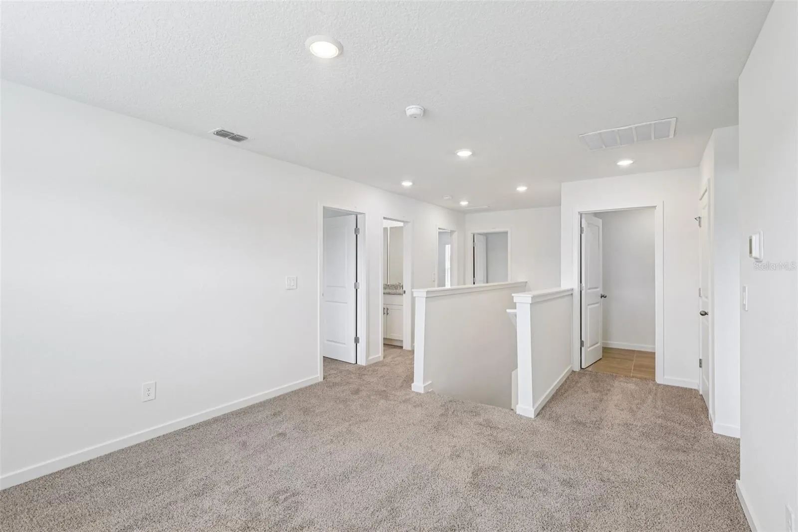 The interior photos are of another home with the same floor plan but different interior color package finishes. Some details may vary