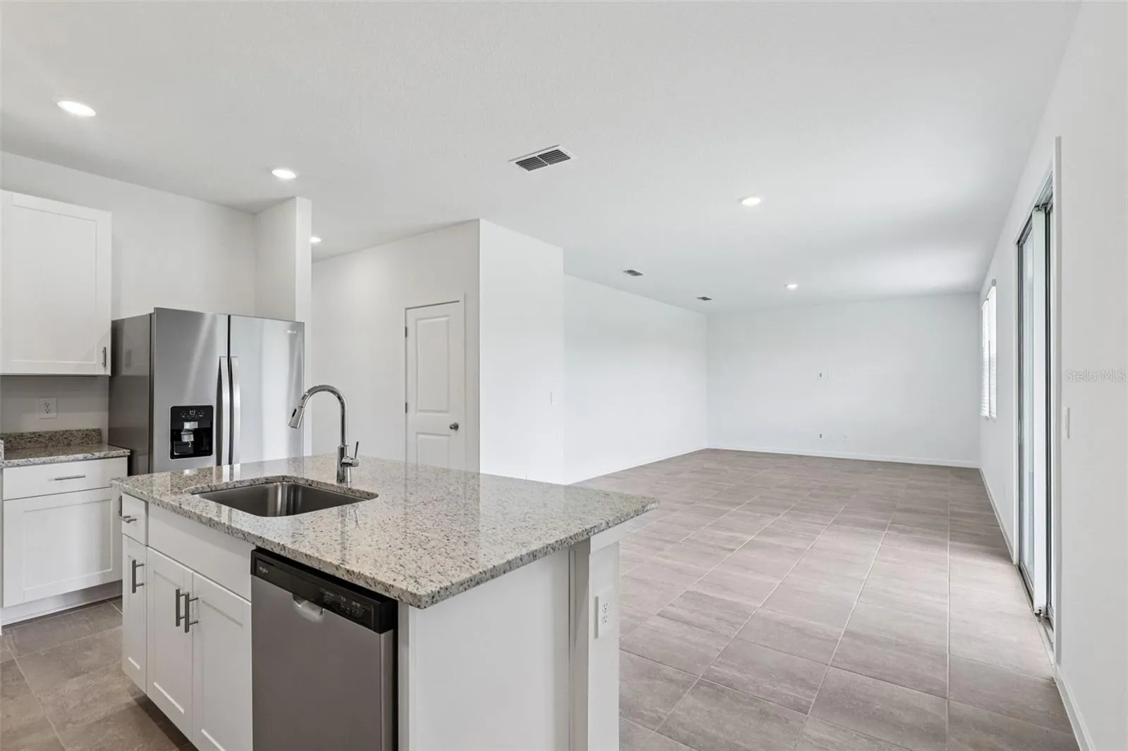 The interior photos are of another home with the same floor plan but different interior color package finishes. Some details may vary