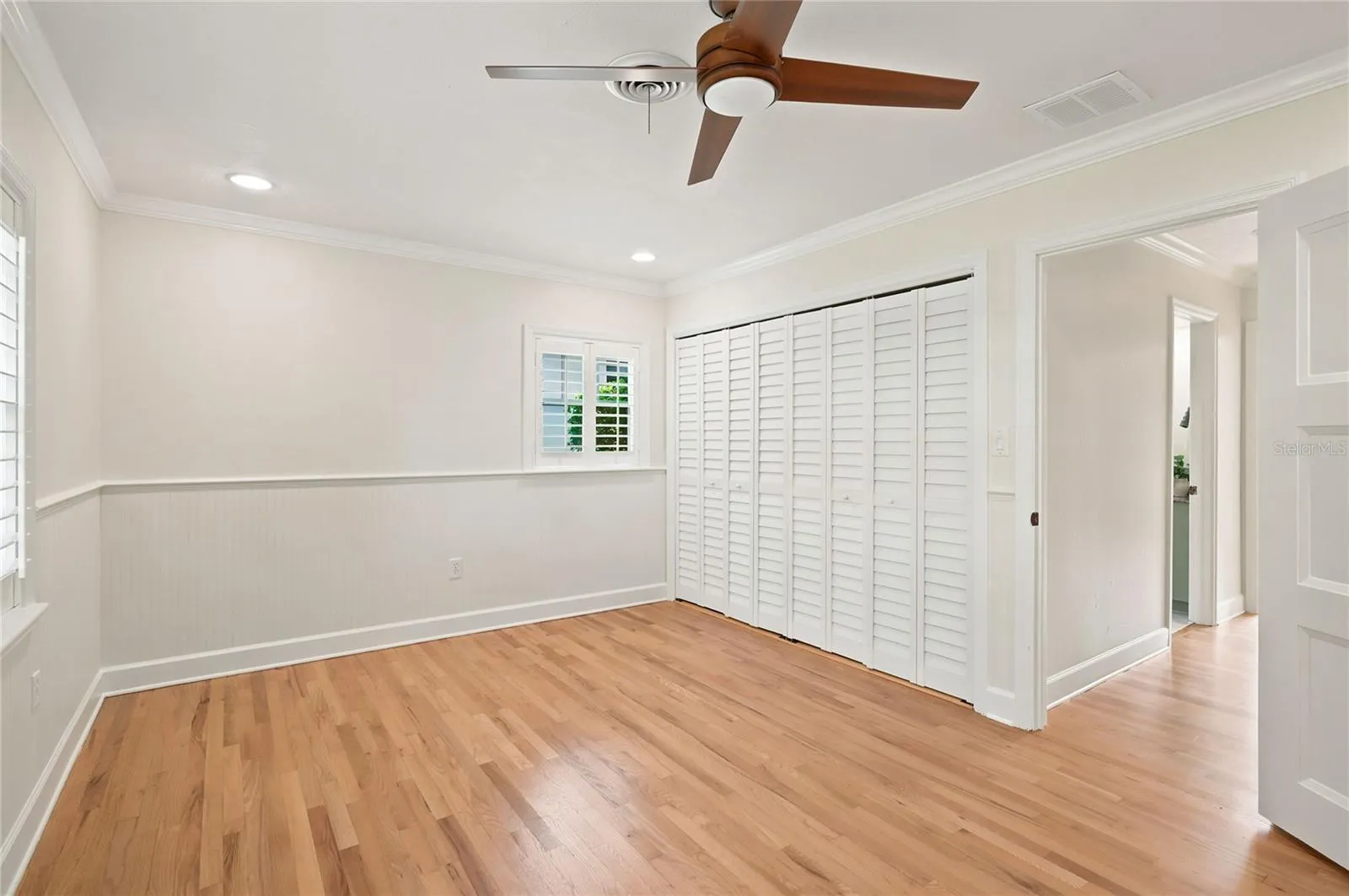 Bedroom 2 with bead board wainscoting