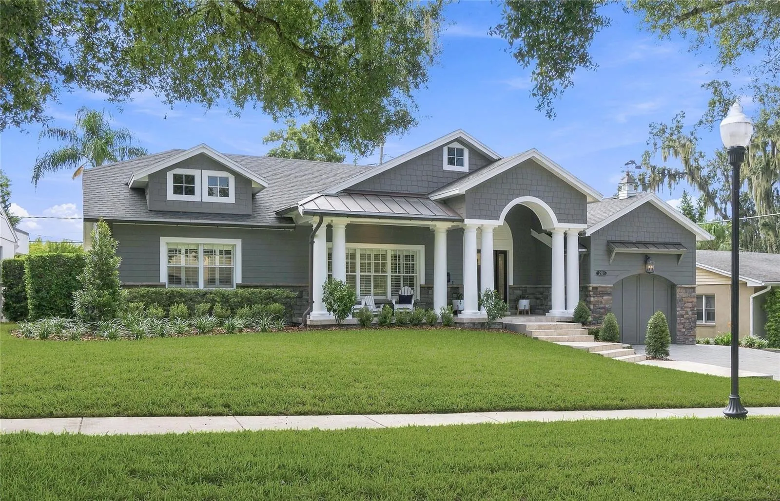 A column-lined front porch add character and dimension.