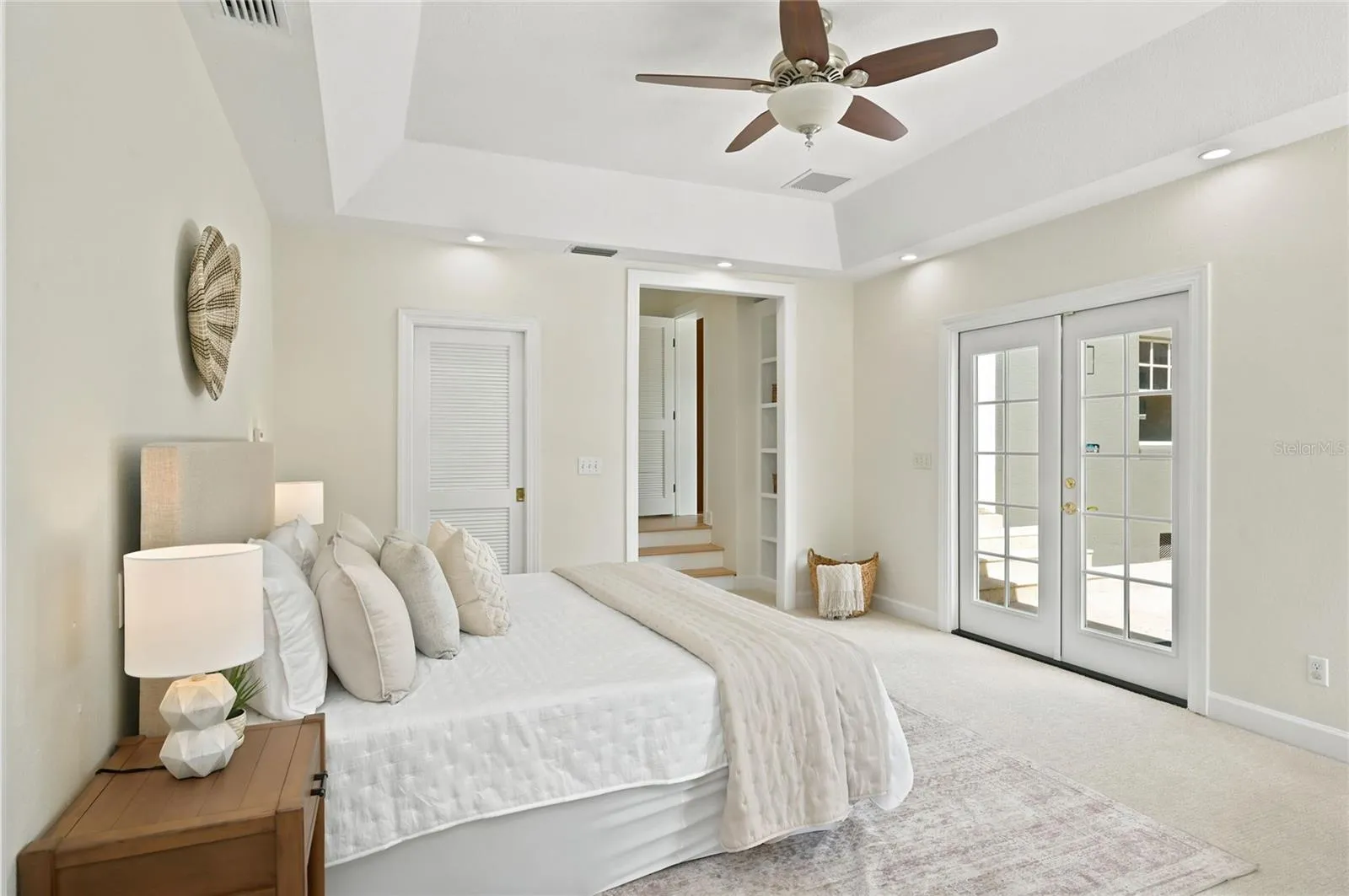 Owner's suite with French doors to Pool area