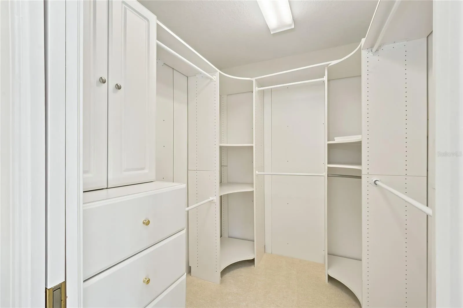 Walk-in customized closet in Owner's suite