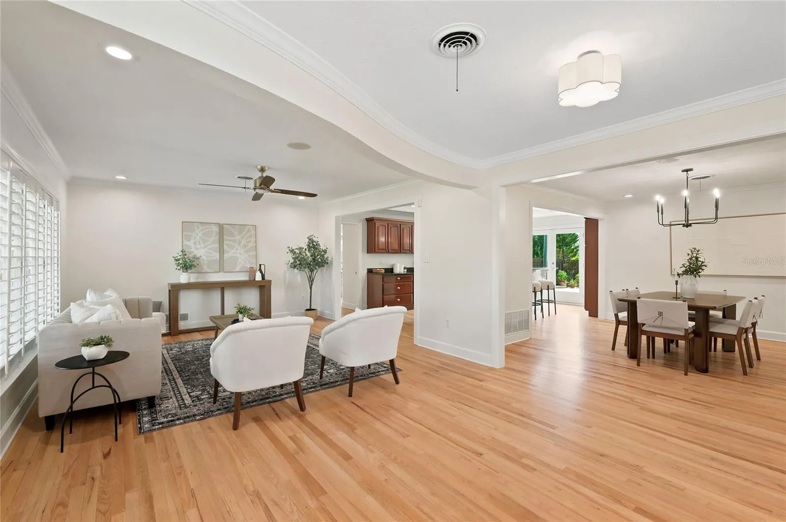 Open Floor Plan with newly refinished natural wood floors.