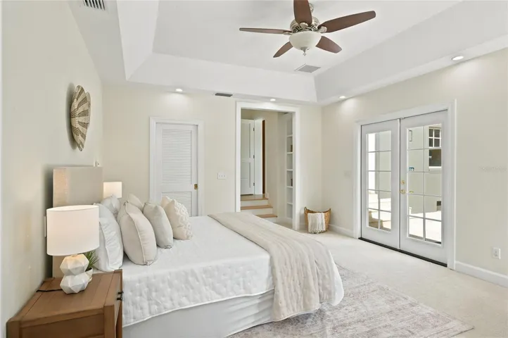 Owner's suite with French doors to Pool area