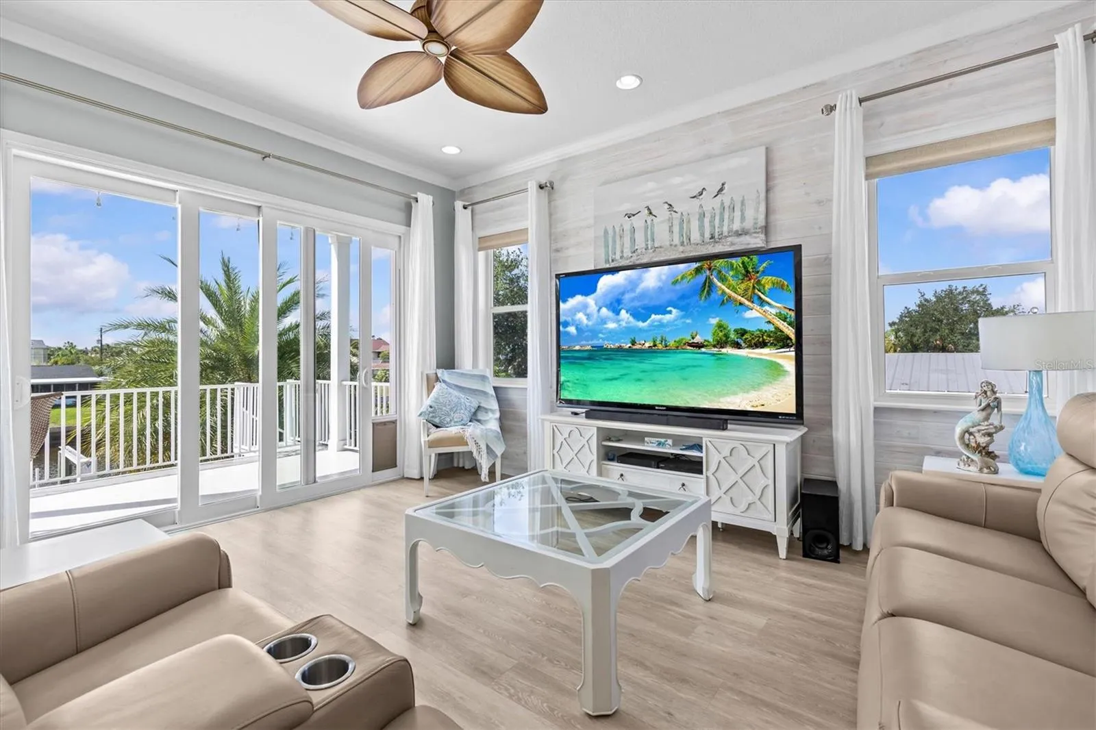 Living Room with Sliding Glass Doors to the Main Back Covered Deck