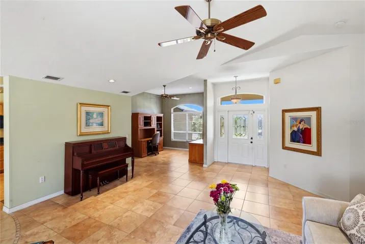 Living room and den/bonus room/office/dining room