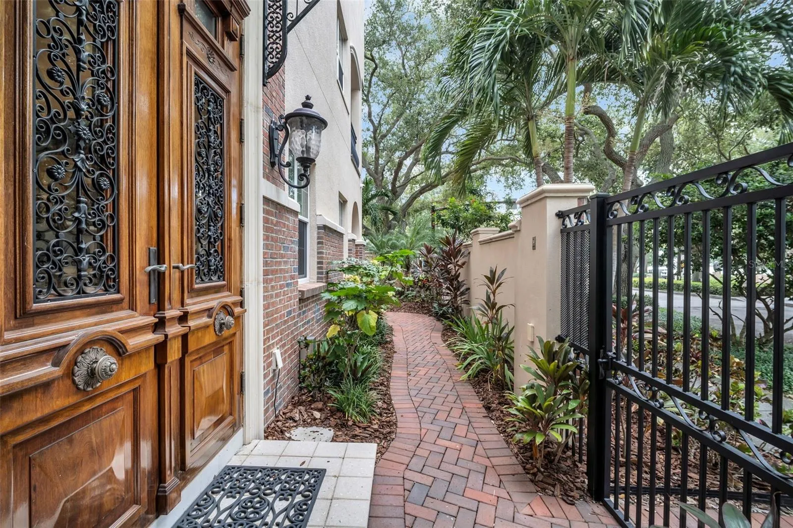 5th Ave NE side entrance with secure gate