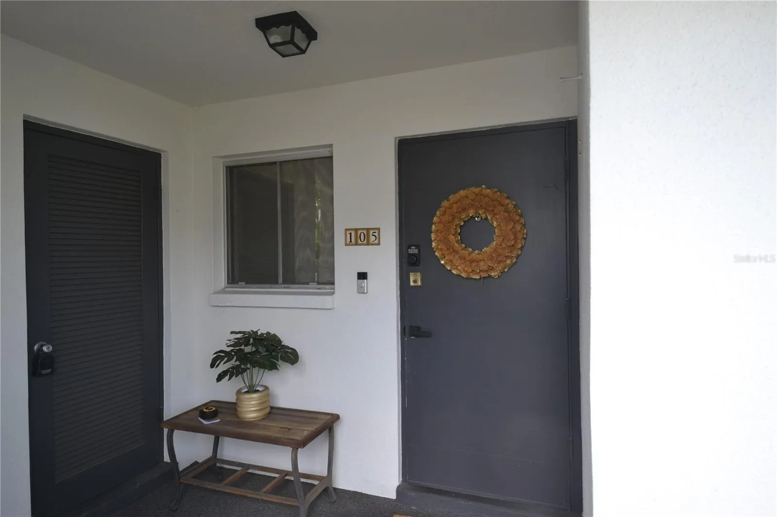 Front entrance w storage on the left