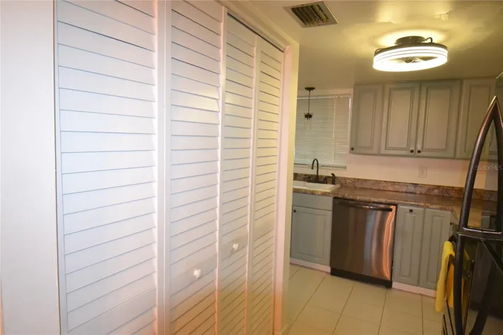Pantry on the left with lots of storage