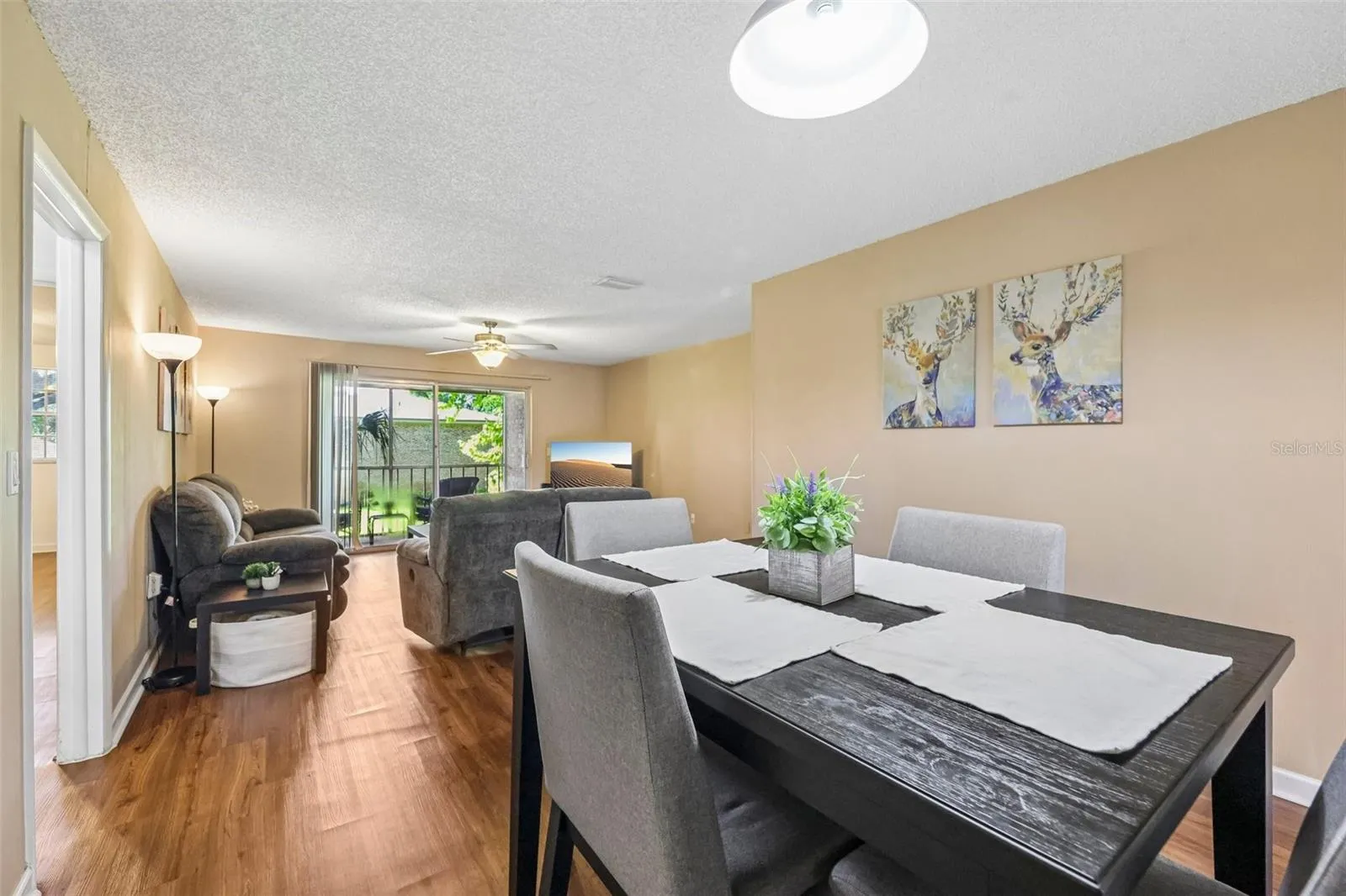 The living room flows into the dining room