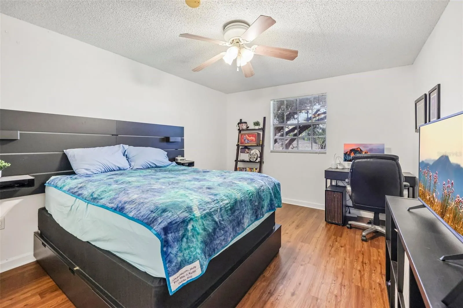 Ceiling fan and plenty of natural light