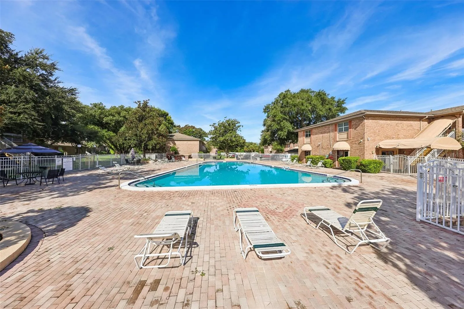 Lounge chairs in pool area