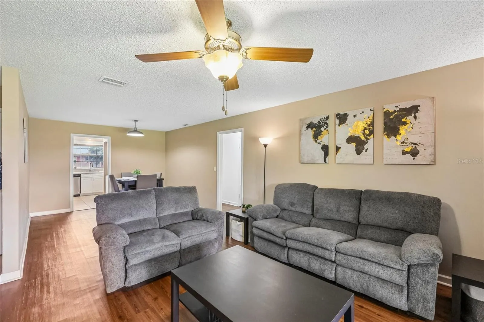 As you walk into the condo, you enter the spacious living room.