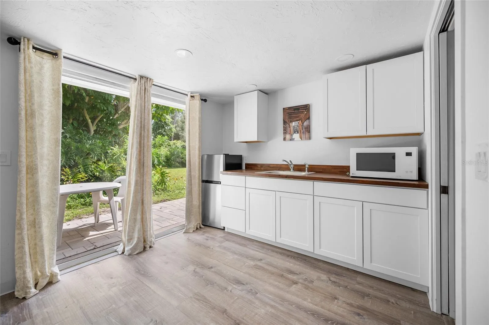 kitchenette with a private porch space